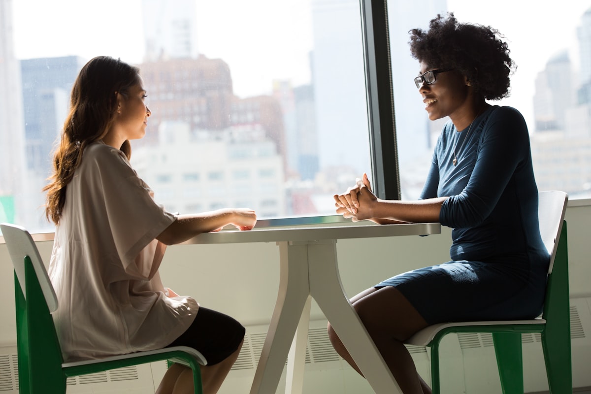 Executive coaching and mentoring conversation between two professionals